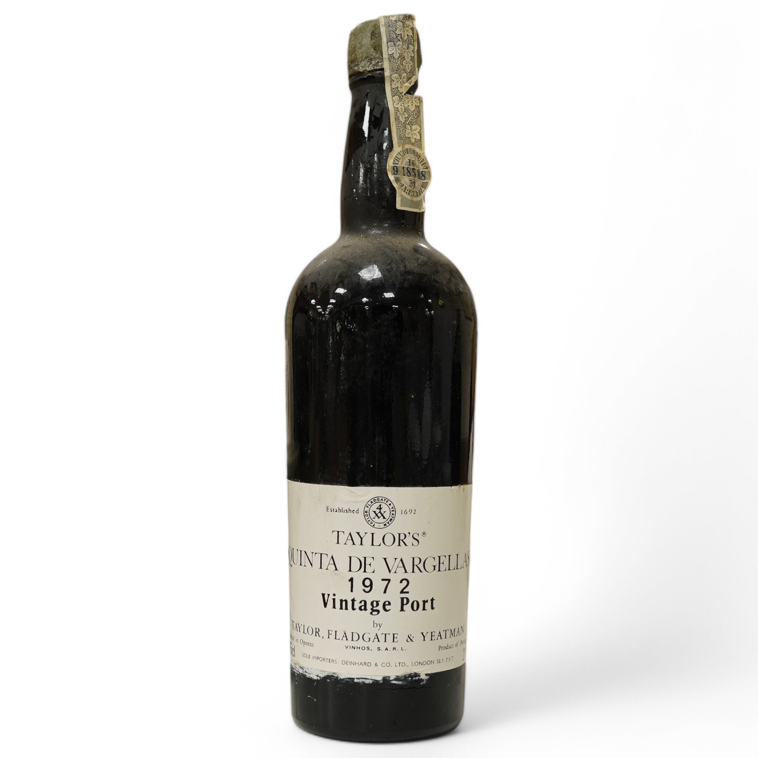 A bottle of Taylor's Quinta De Vargella 1972 vintage port. Condition- worn